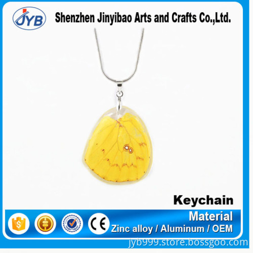 hot sale customized clover amber keychain